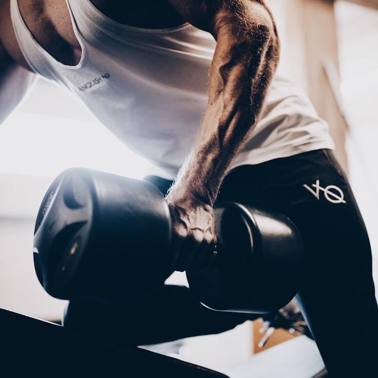 Professional gym interior with weight equipment